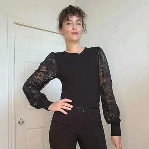 Black long-sleeve bodysuit by Revamped